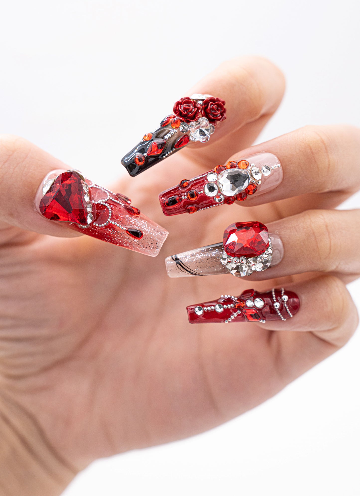 Close up image, Romantic Red & Noir Press-On Nails with Gemstone Embellishments