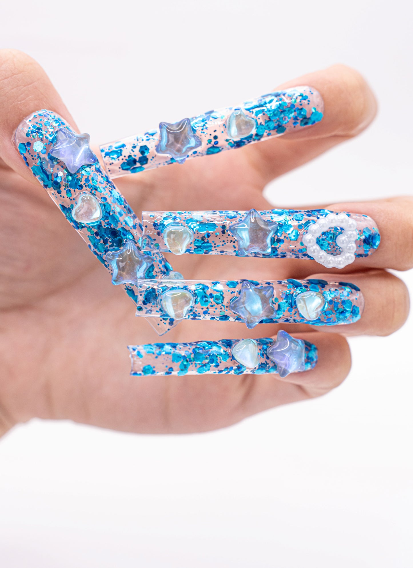 Close up image, Oceanic Sparkle Press-On Nails with Iridescent Stars | Mermaid Dream Nails