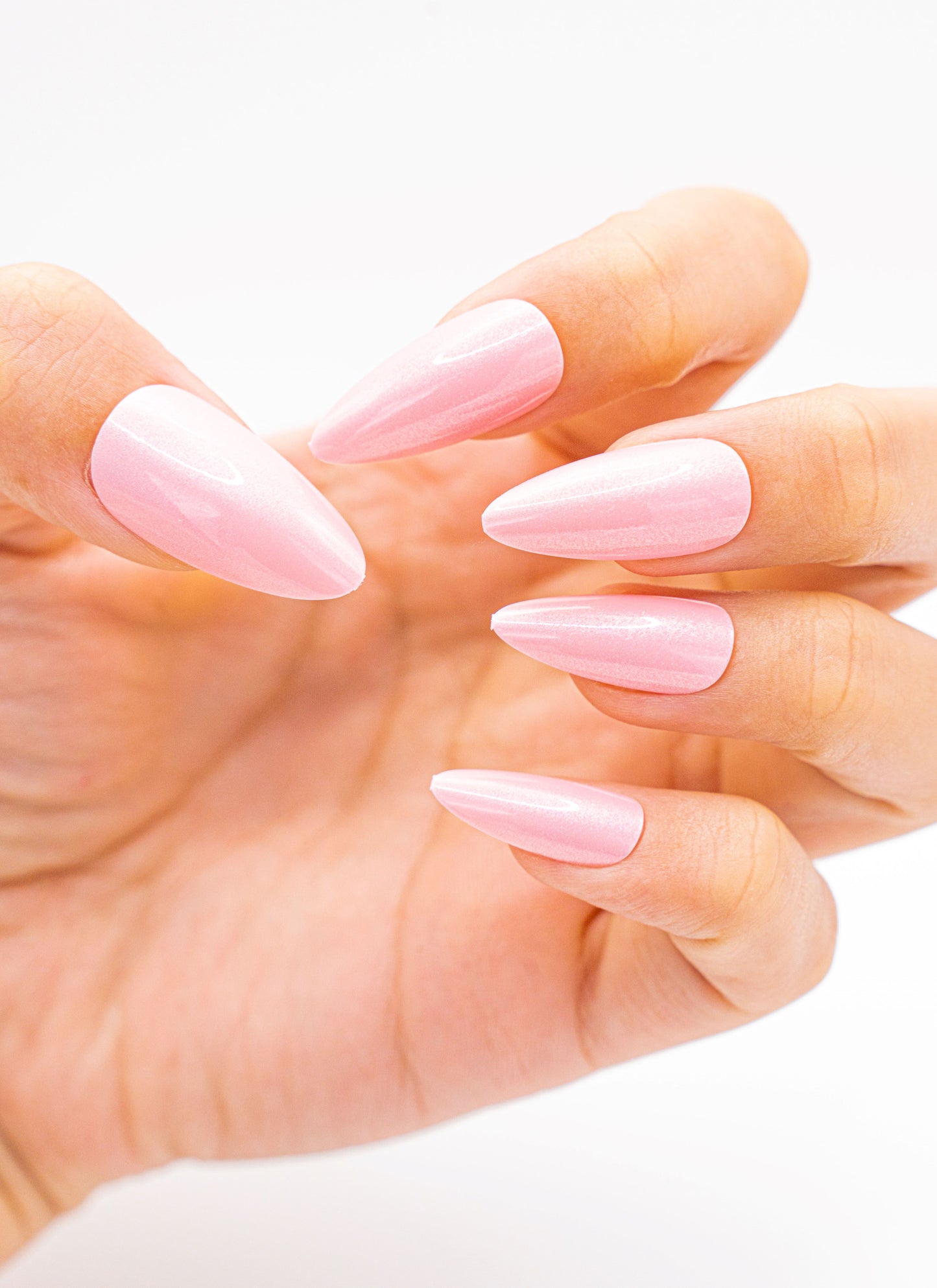Close up image, Blushing Pink Sparkle Press-On Nails: Holographic Stiletto Glam